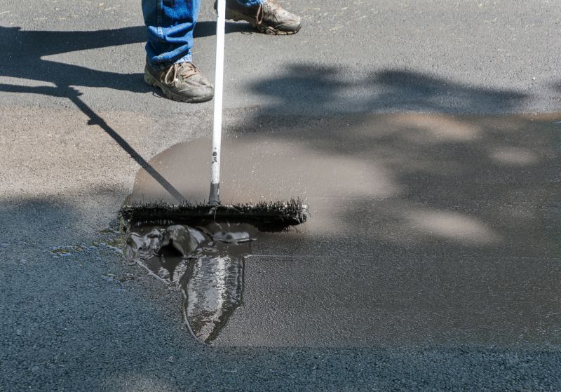 Asphalt Sealcoating Process